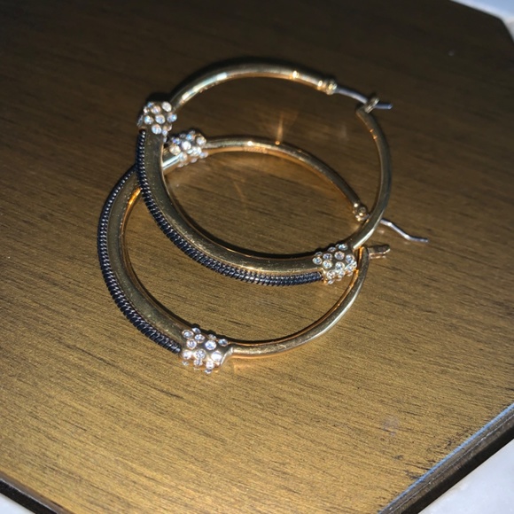 Sparkly 1 3/4 inch hoops in gold-tone with black metal & crystals. - Picture 2 of 9